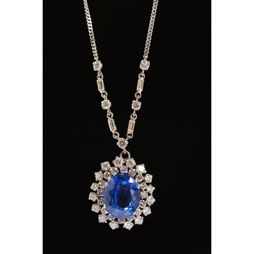 42 - AN IMPRESSIVE LARGE SAPPHIRE AND DIAMOND CENTRE PIECE NECKLET, centring on a principal oval mixed bl... 