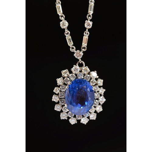 42 - AN IMPRESSIVE LARGE SAPPHIRE AND DIAMOND CENTRE PIECE NECKLET, centring on a principal oval mixed bl... 