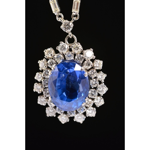 42 - AN IMPRESSIVE LARGE SAPPHIRE AND DIAMOND CENTRE PIECE NECKLET, centring on a principal oval mixed bl... 