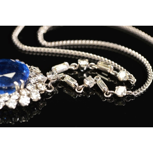 42 - AN IMPRESSIVE LARGE SAPPHIRE AND DIAMOND CENTRE PIECE NECKLET, centring on a principal oval mixed bl... 