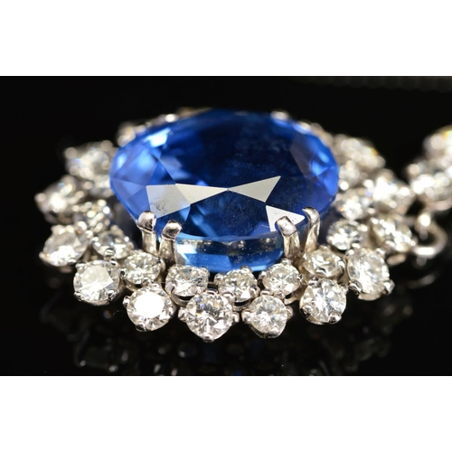 42 - AN IMPRESSIVE LARGE SAPPHIRE AND DIAMOND CENTRE PIECE NECKLET, centring on a principal oval mixed bl... 