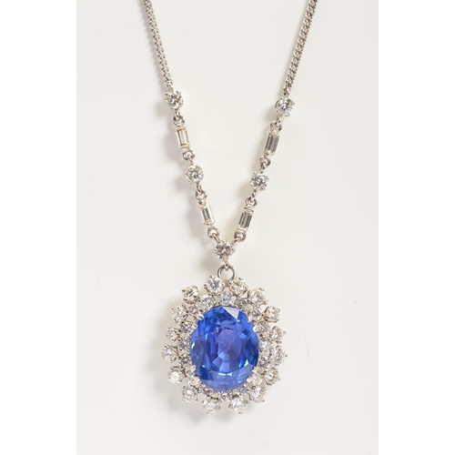 42 - AN IMPRESSIVE LARGE SAPPHIRE AND DIAMOND CENTRE PIECE NECKLET, centring on a principal oval mixed bl... 