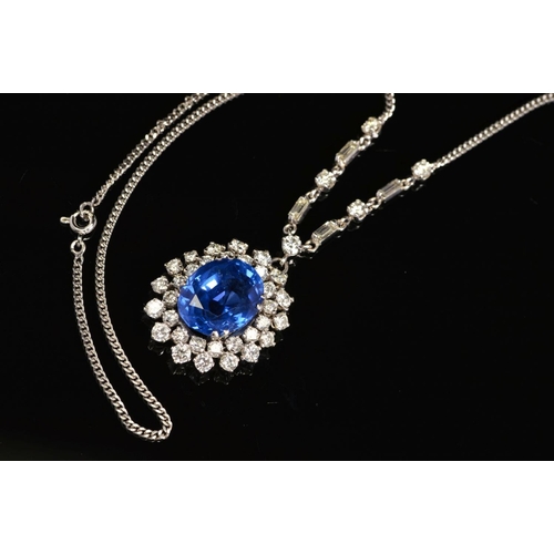 42 - AN IMPRESSIVE LARGE SAPPHIRE AND DIAMOND CENTRE PIECE NECKLET, centring on a principal oval mixed bl... 