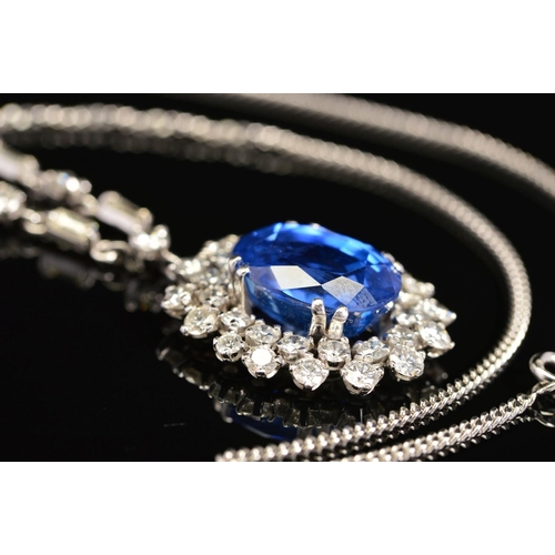 42 - AN IMPRESSIVE LARGE SAPPHIRE AND DIAMOND CENTRE PIECE NECKLET, centring on a principal oval mixed bl... 