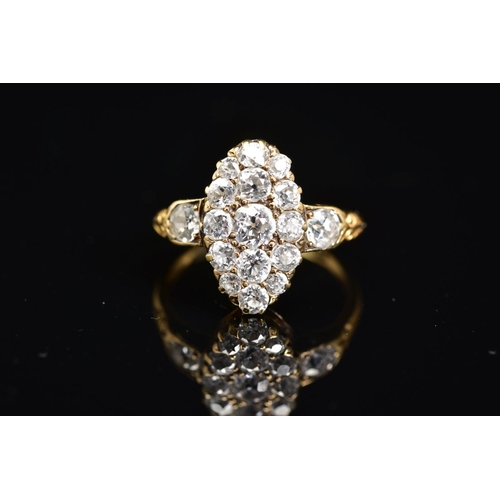 44 - A VICTORIAN GOLD NAVETTE SHAPED DIAMOND CLUSTER RING, estimated old European cut diamond weight 1.35... 