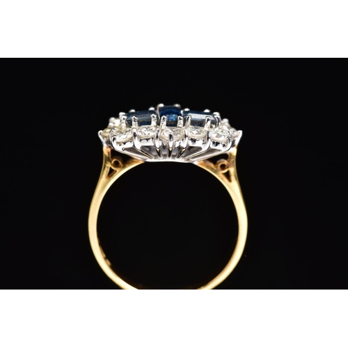 46 - AN 18CT GOLD, SAPPHIRE AND DIAMOND RING, designed as three rectangular cut sapphires, the central ve... 