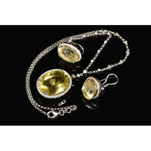 51 - AN 18CT WHITE GOLD, CITRINE AND DIAMOND PENDANT AND MATCHING EARRINGS, the pendant designed as a cen... 