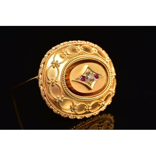 52 - A LATE VICTORIAN GOLD, DIAMOND AND RUBY MEMORIAL BROOCH, of oval outline, the central old cut diamon... 