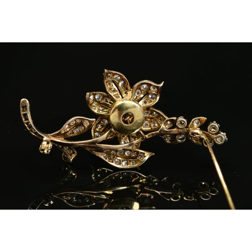 56 - A VICTORIAN GOLD, DIAMOND FLORAL AND FOLIATE BROOCH, mounted en tremblant, the centre flower mounted... 