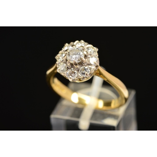 6 - A MODERN ROUND BRILLIANT DIAMOND CLUSTER RING, estimated total diamond weight 0.99ct, ring size R 1/... 