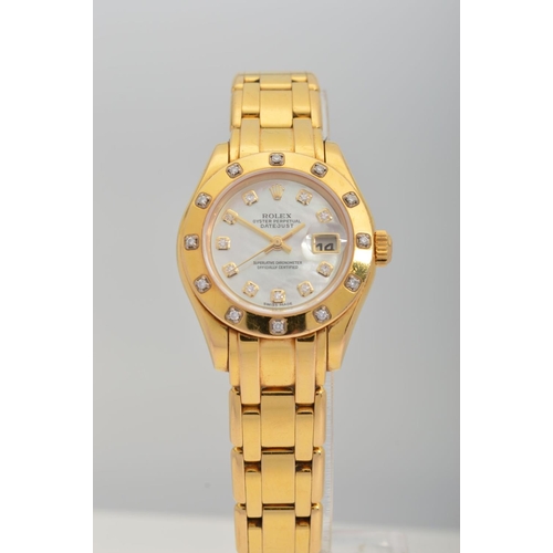 64 - A LADIES 18CT GOLD ROLEX OYSTER PERPETUAL PEARLMASTER WRISTWATCH, 28mm mother of pearl diamond dot d... 