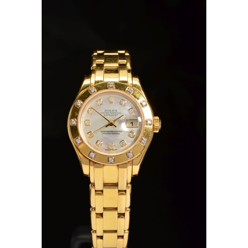 64 - A LADIES 18CT GOLD ROLEX OYSTER PERPETUAL PEARLMASTER WRISTWATCH, 28mm mother of pearl diamond dot d... 