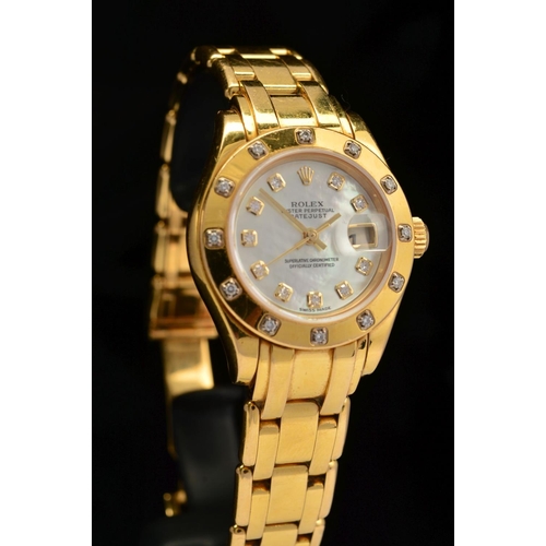 64 - A LADIES 18CT GOLD ROLEX OYSTER PERPETUAL PEARLMASTER WRISTWATCH, 28mm mother of pearl diamond dot d... 