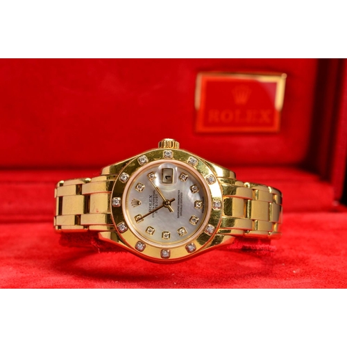 64 - A LADIES 18CT GOLD ROLEX OYSTER PERPETUAL PEARLMASTER WRISTWATCH, 28mm mother of pearl diamond dot d... 