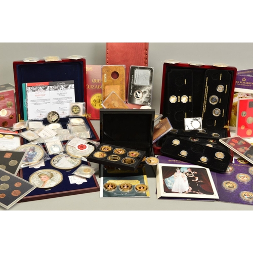 75 - A BOX OF COINS AND COMMEMORATIVES, to include gold layered Queen Elizabeth coin collections by BNT, ... 