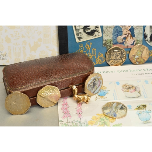 79 - A BOX CONTAINING ROYAL MINT AND BEATRIX POTTER RELATED  ITEMS, to include six Royal Mint packs of fi... 