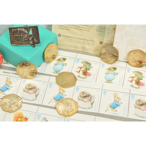 79 - A BOX CONTAINING ROYAL MINT AND BEATRIX POTTER RELATED  ITEMS, to include six Royal Mint packs of fi... 