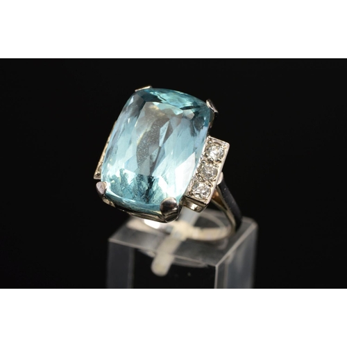 8 - AN ART DECO AQUAMARINE AND DIAMOND RING, centring on a rectangular cut aquamarine measuring approxim... 