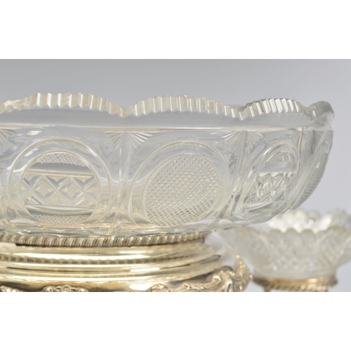 89 - AN EARLY 19TH CENTURY OLD SHEFFIELD PLATE CENTREPIECE, with central circular cut glass bowl in a gad... 