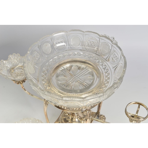 89 - AN EARLY 19TH CENTURY OLD SHEFFIELD PLATE CENTREPIECE, with central circular cut glass bowl in a gad... 