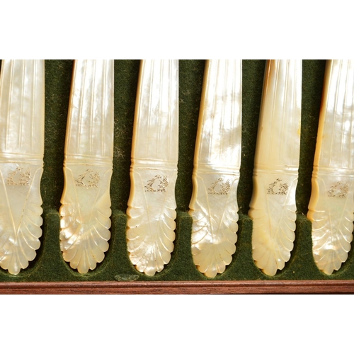 94 - A 19TH CENTURY MAHOGANY CASED SET OF MOTHER OF PEARL HANDLED CUTLERY, comprising twenty four table k... 