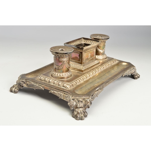 96 - A VICTORIAN SILVER INKSTAND, of shaped rectangular form, fitted with a central deep rectangular open... 