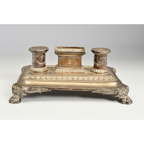 96 - A VICTORIAN SILVER INKSTAND, of shaped rectangular form, fitted with a central deep rectangular open... 