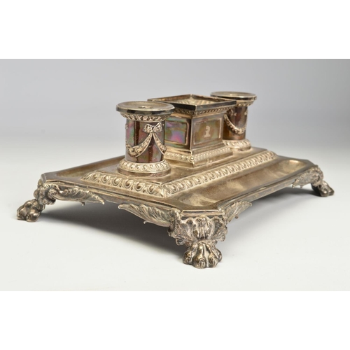 96 - A VICTORIAN SILVER INKSTAND, of shaped rectangular form, fitted with a central deep rectangular open... 