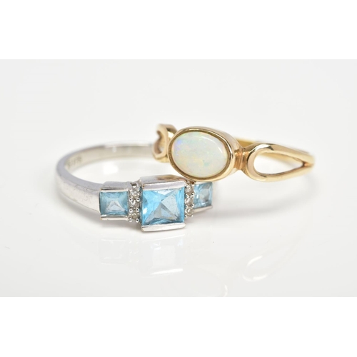 116 - TWO 9CT GOLD GEM SET RINGS, the first designed with a central oval opal cabochon in collet mount to ... 
