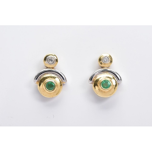 120 - A PAIR OF EMERALD AND DIAMOND SET EARRINGS, each set with a central circular cut emerald within bi-c... 