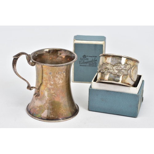 121 - AN EARLY 20TH CENTURY SILVER CHRISTENING MUG AND A CHINESE NAPKIN RING, the christening mug of waist... 