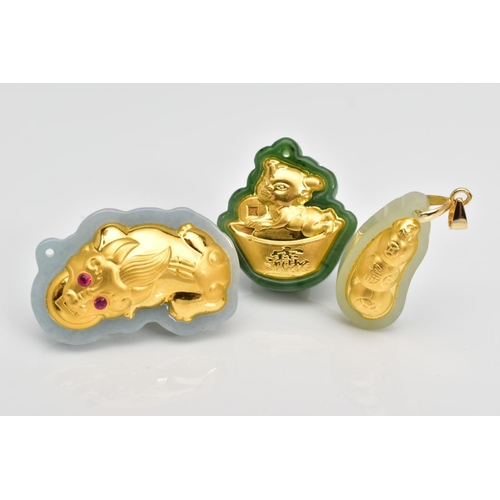130 - THREE JADE PENDANTS, designed as carved polished shapes with embossed yellow metal panels to one sid... 