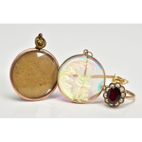134 - A 9CT GOLD CLUSTER RING AND TWO PENDANTS, the ring designed as a central oval red paste within a spl... 