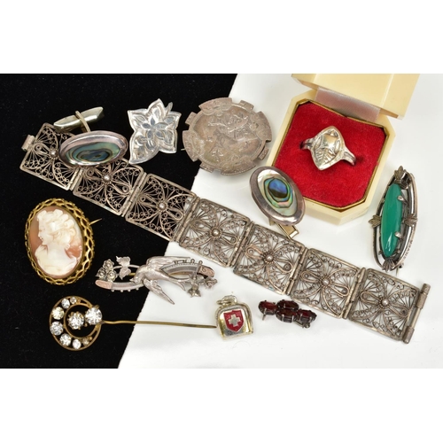 137 - A SELECTION OF JEWELLERY, to include a filigree bracelet, two late Victorian silver brooches, a came... 