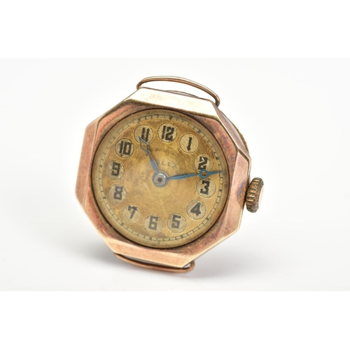 138 - A 1920'S 15CT GOLD ROLEX WATCH HEAD, the circular watch face with Arabic numerals within a hexagon s... 