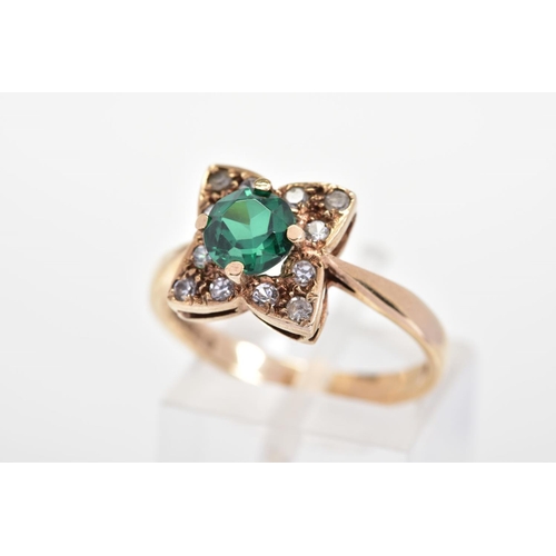 149 - A 9CT GOLD PASTE CLUSTER RING, the central circular green paste within a circular colourless paste s... 
