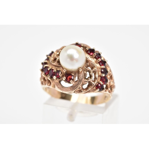 18 - A GEM RING, designed as a tapered band with textured pierced and scrolling decoration to the central... 