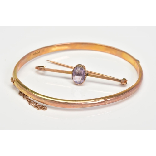 188 - TWO ITEMS OF 9CT GOLD JEWELLERY, to include a plain hinged bangle, inner diameter 60mm, together wit... 