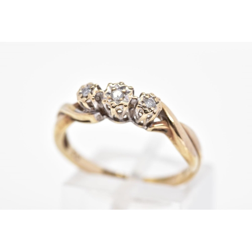 189 - A 9CT GOLD THREE STONE DIAMOND RING, designed as three graduated brilliant cut diamonds within illus... 