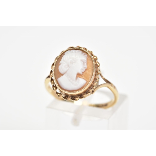 19 - A 9CT GOLD CAMEO RING, the oval cameo panel depicting a lady in profile within a rope twist surround... 
