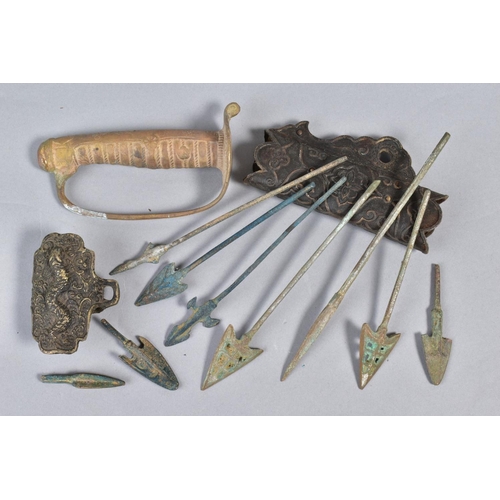 264 - A BAG CONTAINING VARIOUS METAL PARTS AND SWORD GRIPS and a number of possible air dropped darts or f... 