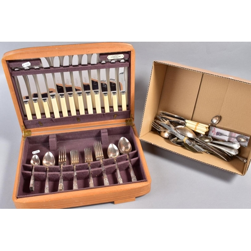 304 - AN OAK CASED CANTEEN OF CUTLERY, for six settings and a box of loose cutlery (2)