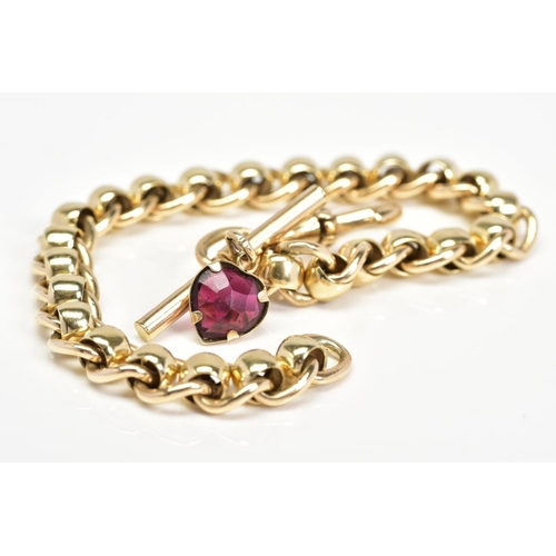 32 - A MODERN 9CT GOLD ROLLER BALL LINK BRACELET FITTED TO A T BAR, garnet heart drop and swivel clasp, m... 