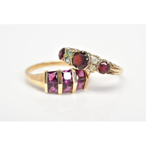 45 - TWO GEM SET RINGS, the first set with six square cut garnets, set in two slightly angled rows to the... 