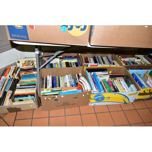 452 - SEVEN BOXES OF BOOKS, to include car manuals, Penguin paperback, etc