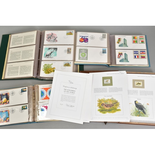 461 - STAMPS/FIRST DAY COVERS, two albums of U.N FDCS, one album of Songbirds mint collection and one albu... 