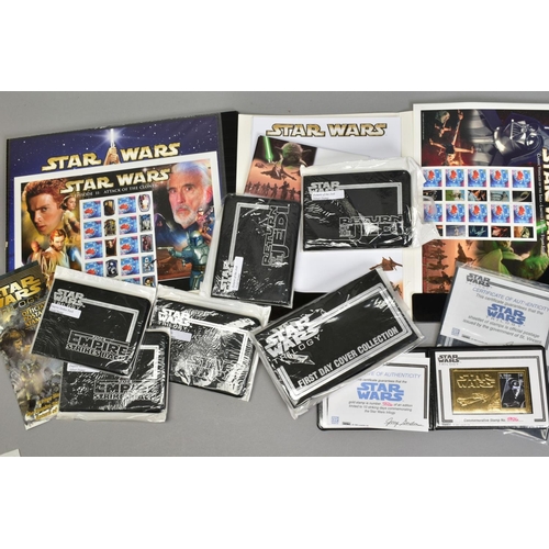 471 - STAR WARS STAMPS, a collection of Smilers sheets, first day covers and gold and silver stamps, all w... 