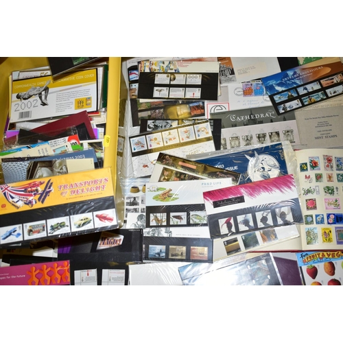 483 - LARGE COLLECTION OF STAMPS IN YELLOW BOX, main value in approximately seventy GB presentation packs,... 