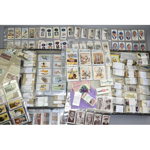 498 - A LARGE COLLECTION OF CARRERAS AND CHURCHMAN CIGARETTE CARDS in two lock spring boxes and consisting... 