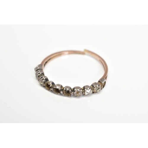 50 - A LATE GEORGIAN DIAMOND HALF ETERNITY RING, with closed back settings for ten diamonds, set with six... 